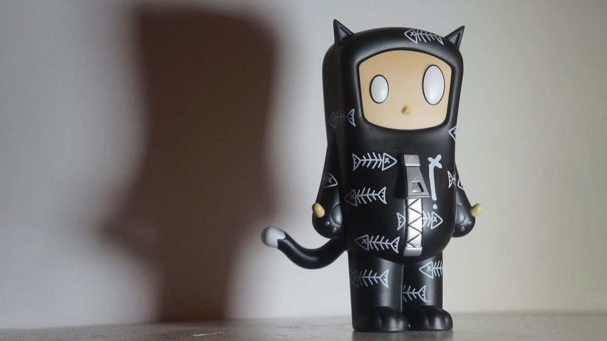 You are currently viewing Tenacious Toys Unique ‘Child in a Cat Costume – Fish Bone’ by ChrisRWK x Strangecat Toys x UVD Toys